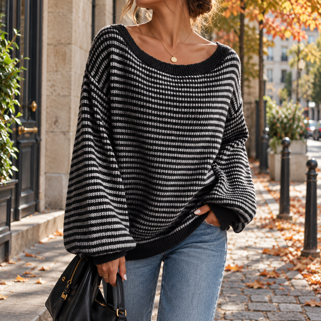 Maglione donna nero a righe bianche con maniche lunghe a palloncino