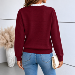 Retro del maglione bordeaux con bordo bianco traforato al collo e fondo a coste