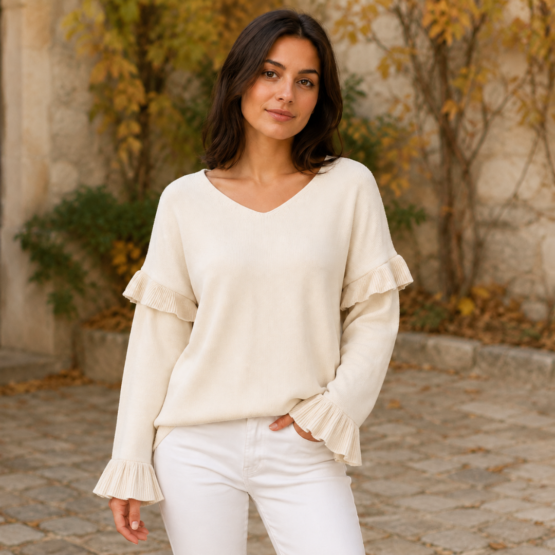 Maglione donna albicocca con scollo a V e volant sulle spalle, vista frontale
