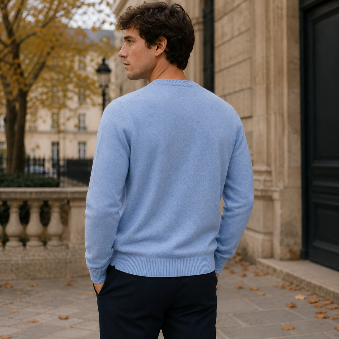 Vista posteriore del maglione azzurro da uomo con fondo a coste