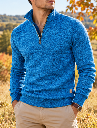 Maglione uomo azzurro melangiato con mezza zip aperta sul collo alto