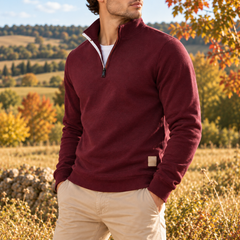 Maglione rosso da uomo con zip aperta sul collo e polsini a coste