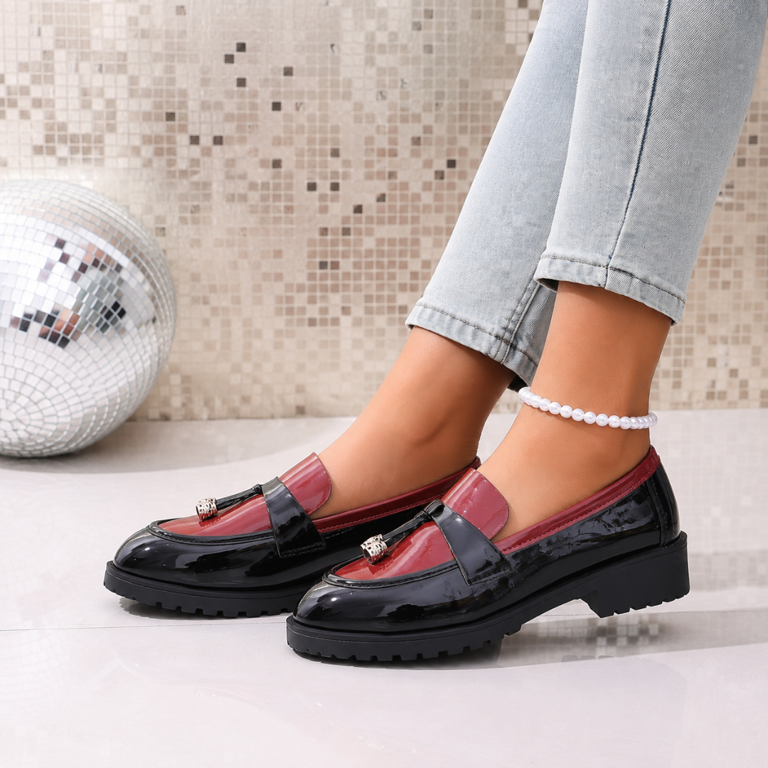 Mocassini donna slip-on bicolore dall'aspetto lucido con suola carrarmato spessa