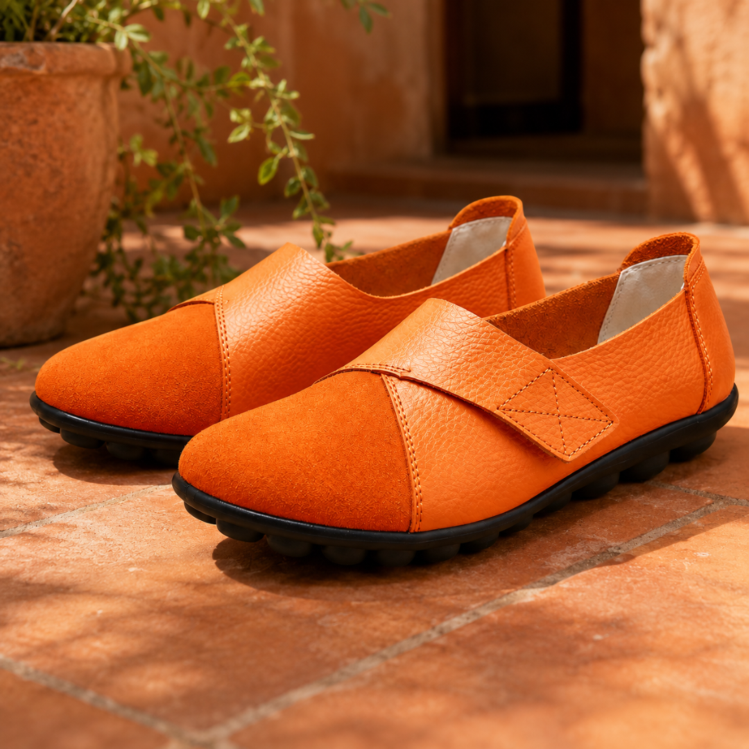 Mocassini donna arancioni slip on con fascia incrociata e suola nera a pastiglie