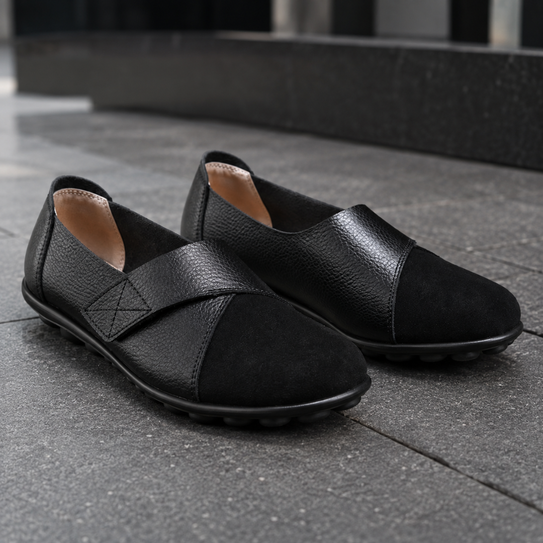 Mocassini donna neri slip on con punta tonda a contrasto e fascia incrociata