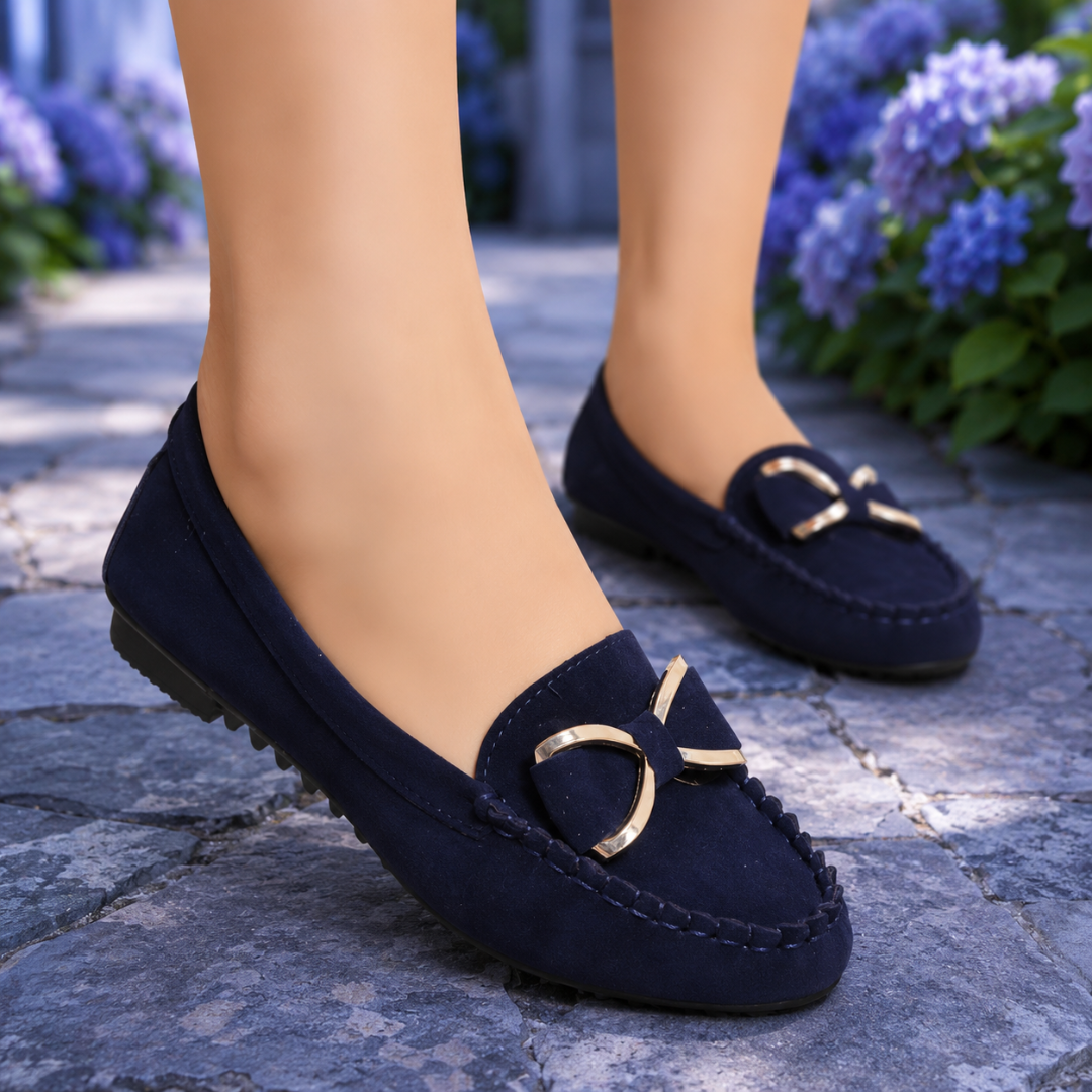Mocassini donna blu navy con fiocco e inserto dorato sul collo del piede