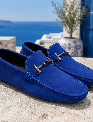 Mocassini donna blu slip-on con morsetto metallico e punta arrotondata