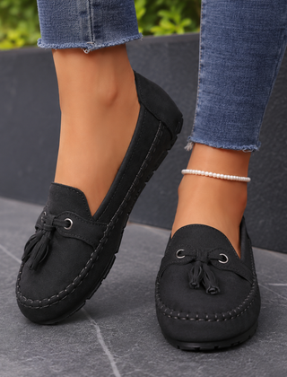 Mocassini donna neri slip-on con nappine e cuciture a vista sul bordo