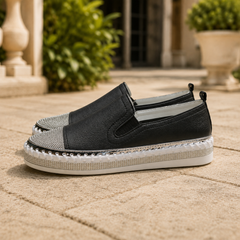 Mocassini slip-on neri con punta in strass e inserto elastico laterale