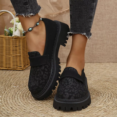 Mocassini donna neri slip-on con fascetta e bordo con cuciture a vista