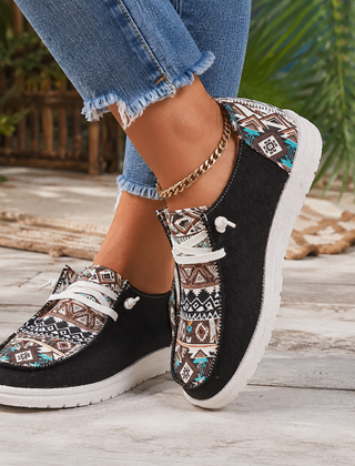 Mocassini donna neri con inserti azteca multicolore e suola bianca a contrasto