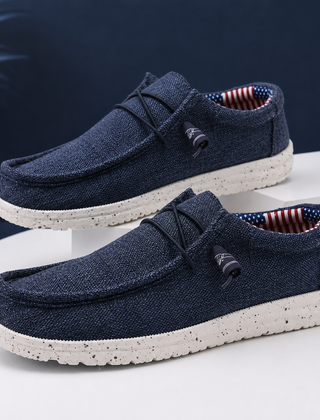 Mocassini uomo blu navy con punta a cucitura mocassino e suola chiara