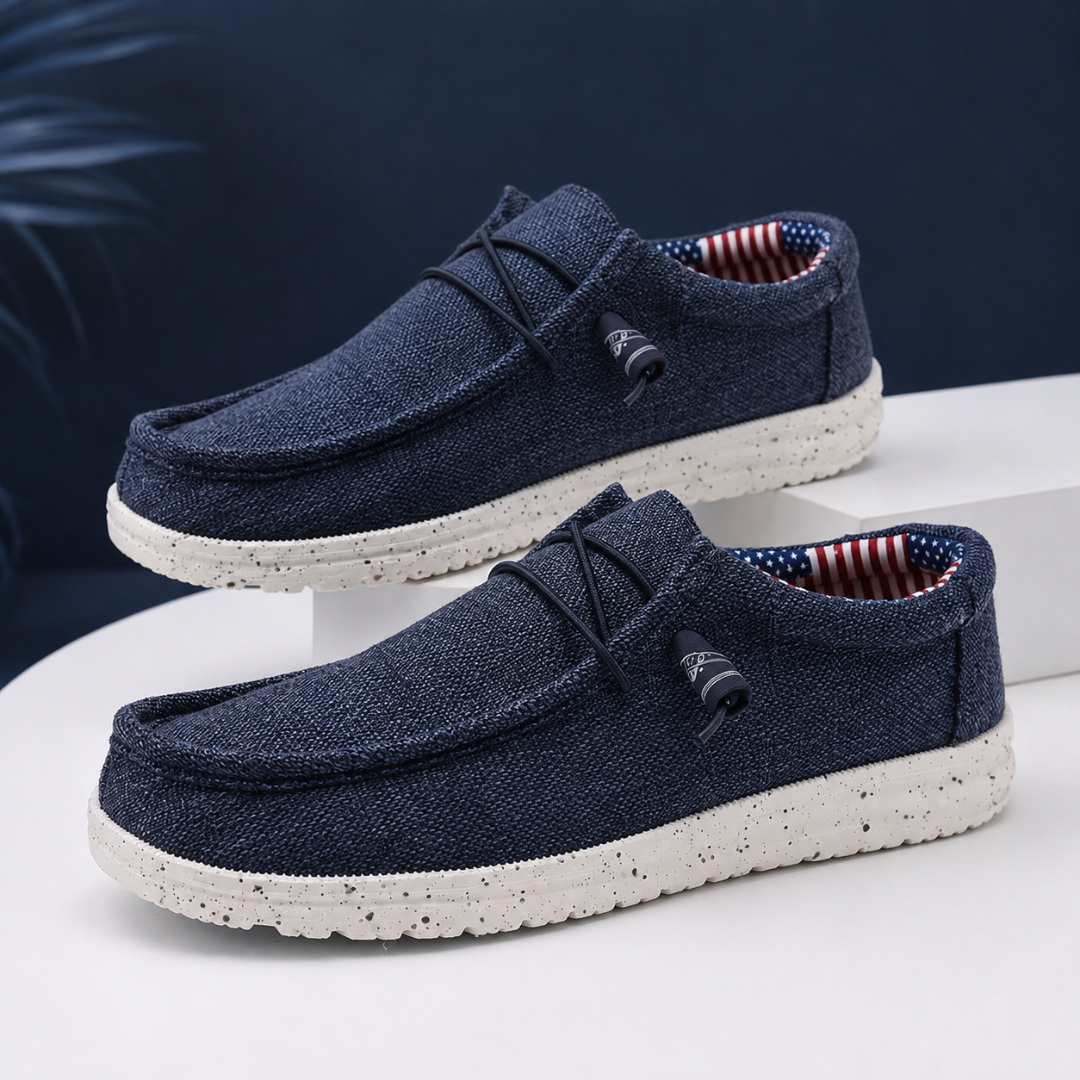 Mocassini uomo blu navy con punta a cucitura mocassino e suola chiara