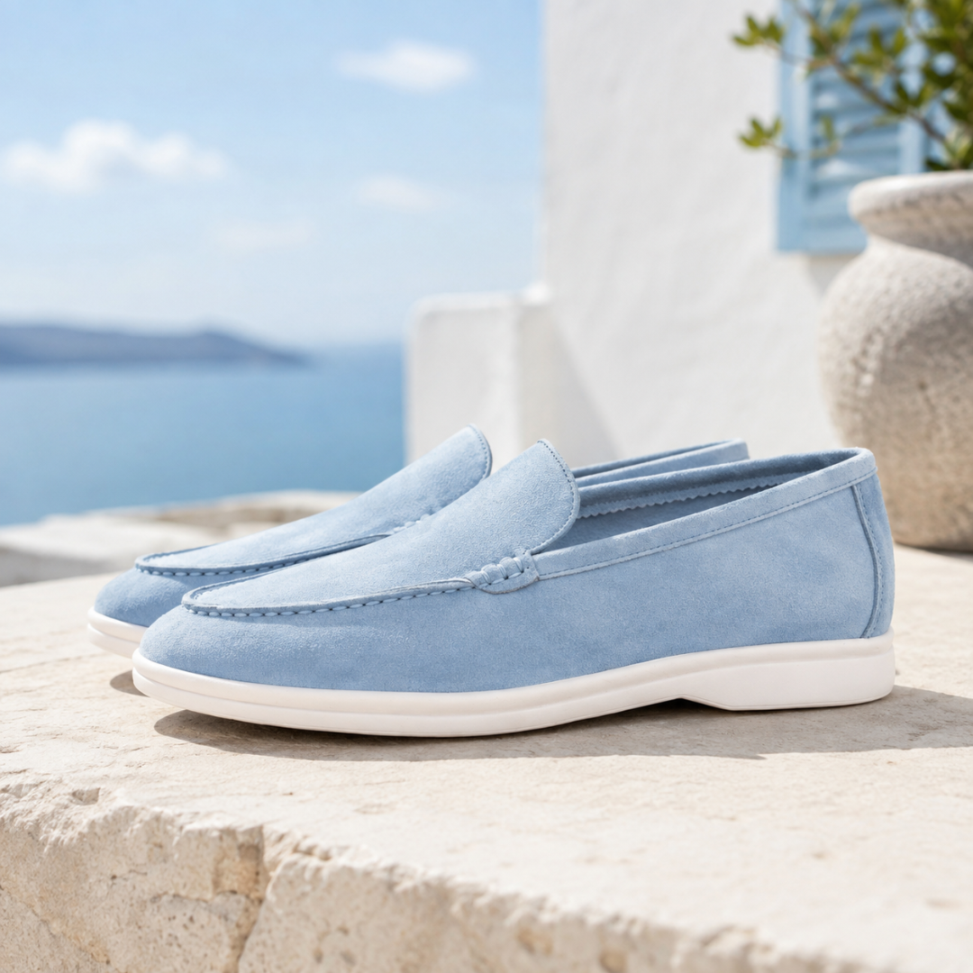 Mocassini uomo azzurri slip-on con nodo decorativo e suola bianca