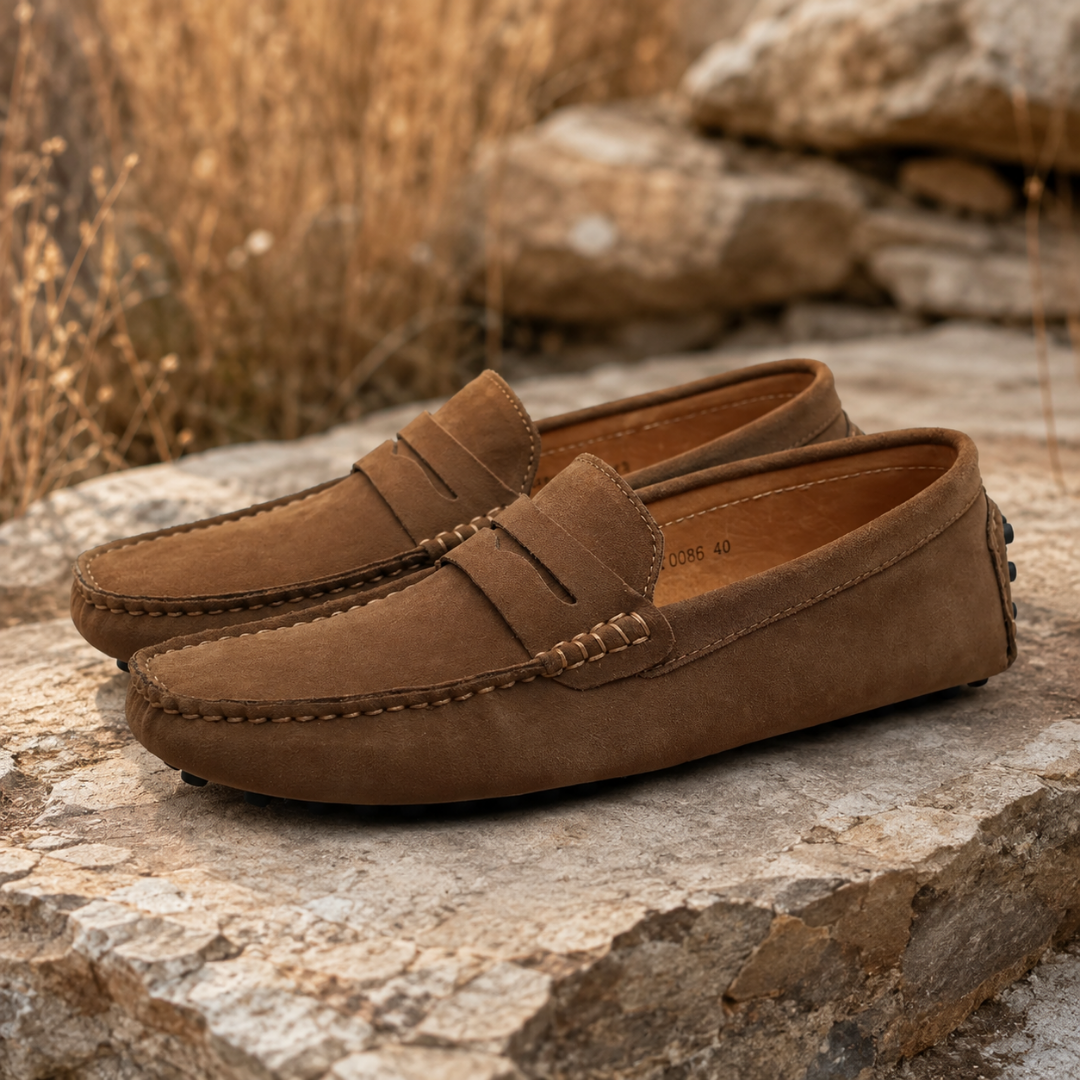 Mocassini uomo marroni slip-on con cuciture a vista e punta arrotondata