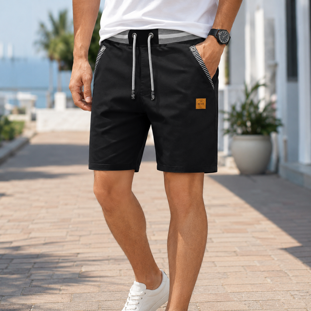Pantaloncini uomo neri con coulisse chiara e profili a righe sulle tasche