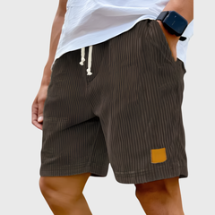 Pantaloncini uomo marrone scuro a coste con tasche laterali e vita elastica