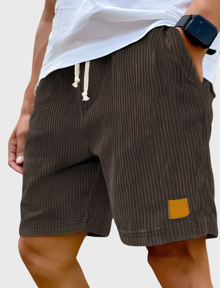 Pantaloncini uomo marrone scuro a coste con tasche laterali e vita elastica