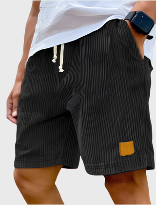 Pantaloncini uomo neri a coste con laccetti chiari ed etichetta gialla laterale