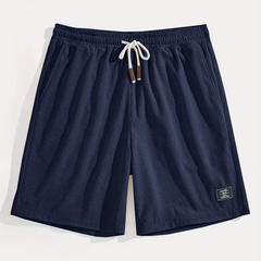 Pantaloncini blu navy distesi con coulisse bianca e texture a nido d'ape