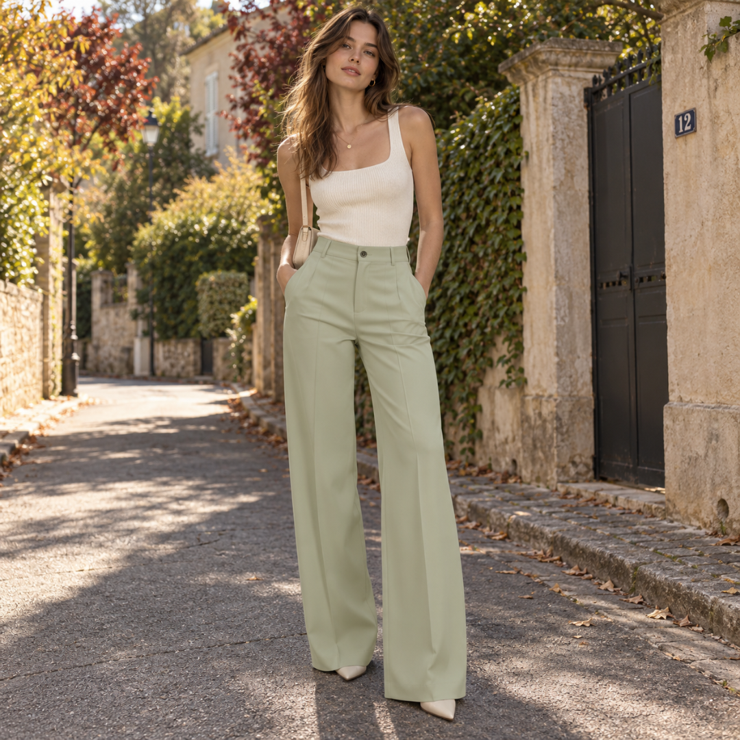Pantaloni donna verde chiaro a gamba larga con passanti in vita e zip