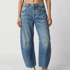 Pantaloni donna blu con sfumature schiarite sulle gambe e linea tonda alla caviglia