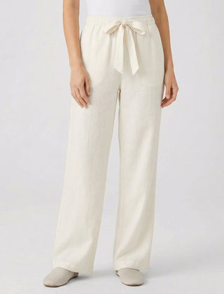Pantaloni beige chiaro a gamba larga con cintura in coulisse annodata