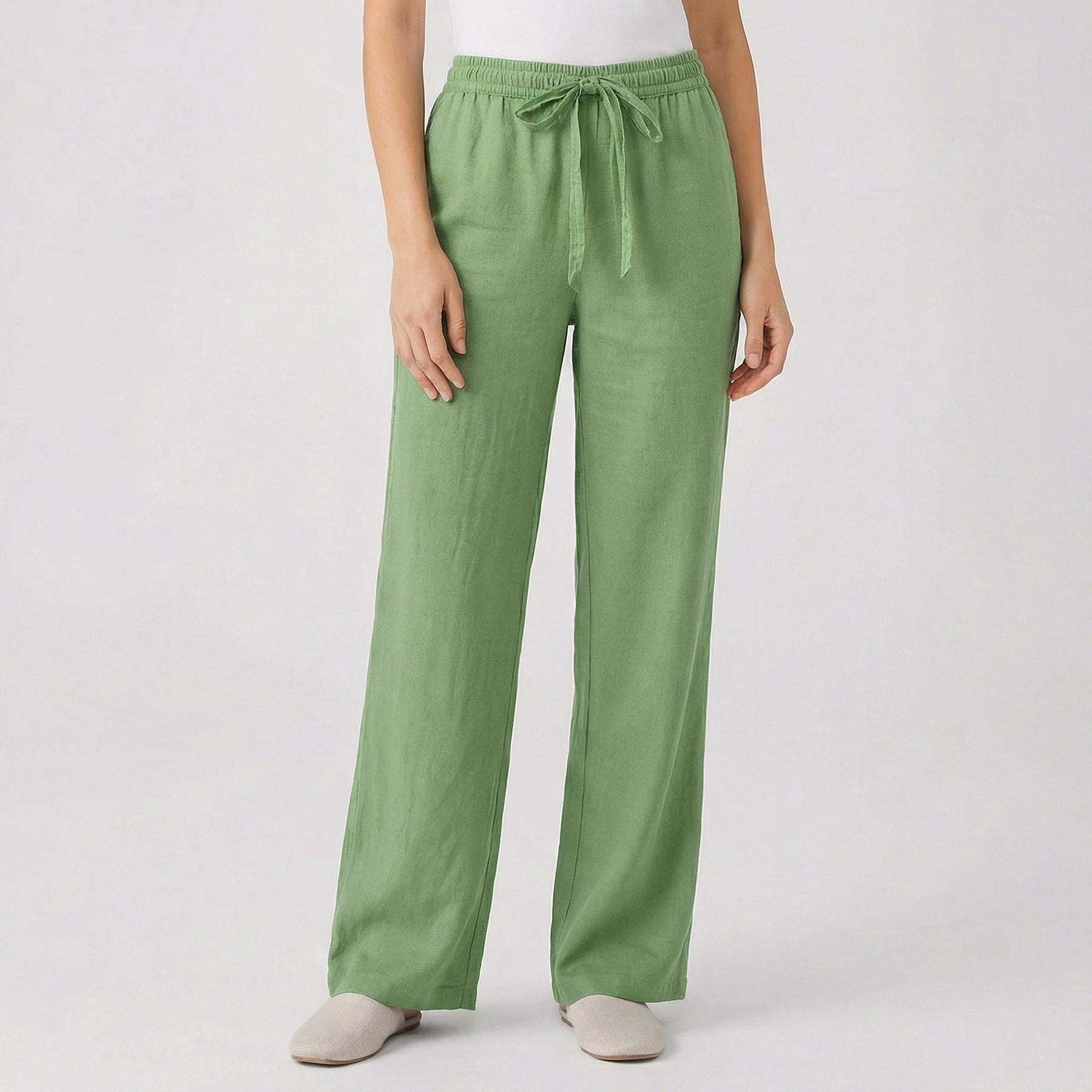 Pantaloni verdi a gamba larga con vita elasticizzata e nastro da annodare