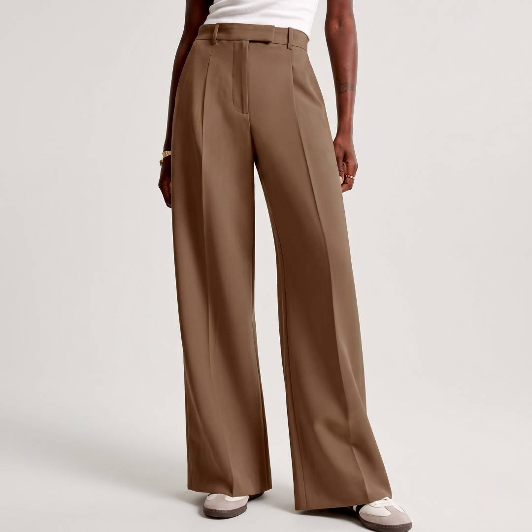 Pantaloni cammello a gamba larga con vita alta e piega centrale marcata