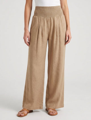 Pantaloni donna beige a gamba larga con vita alta arricciata e pieghe