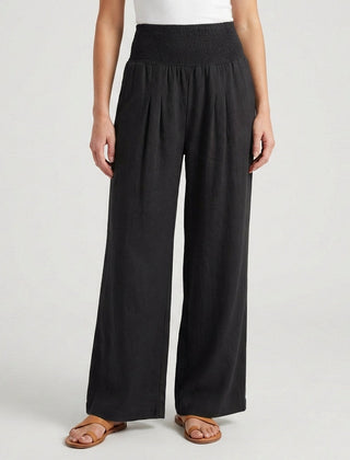 Pantaloni palazzo neri a vita alta con fascia arricciata e linea fluida