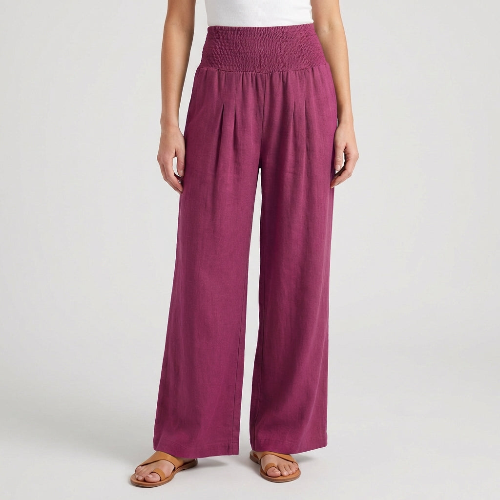 Pantaloni palazzo rosa scuro con pieghe morbide sul davanti e caduta ampia