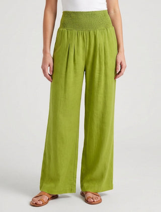 Pantaloni donna verde chiaro luminoso con gamba ampia e pieghe davanti