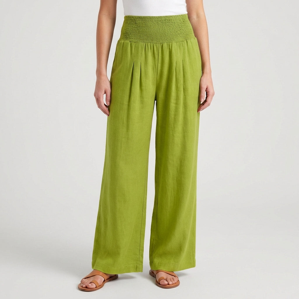Pantaloni donna verde chiaro luminoso con gamba ampia e pieghe davanti