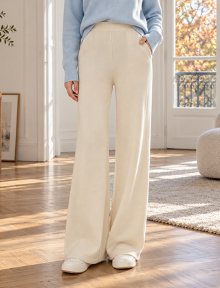 Pantaloni donna crema in maglia a gamba larga con vita alta e bordi a coste