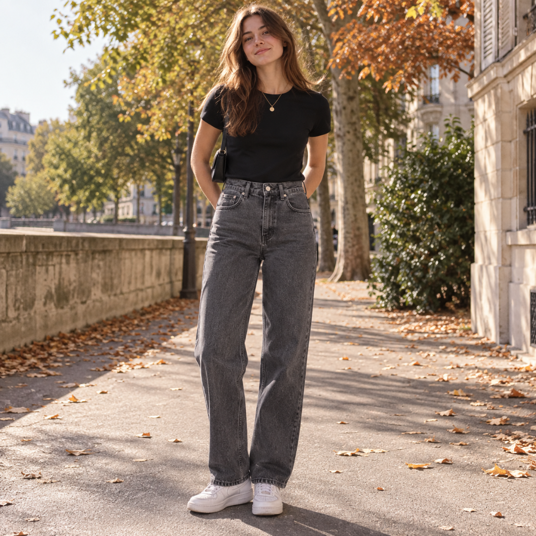 Pantaloni donna neri lavati a vita alta con gamba larga e chiusura con bottone