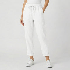 Pantaloni donna bianchi in cotone con coulisse annodata e caviglia scoperta