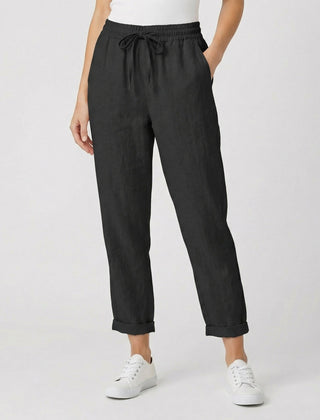Pantaloni donna neri con vita elastica, tasche laterali e gamba affusolata