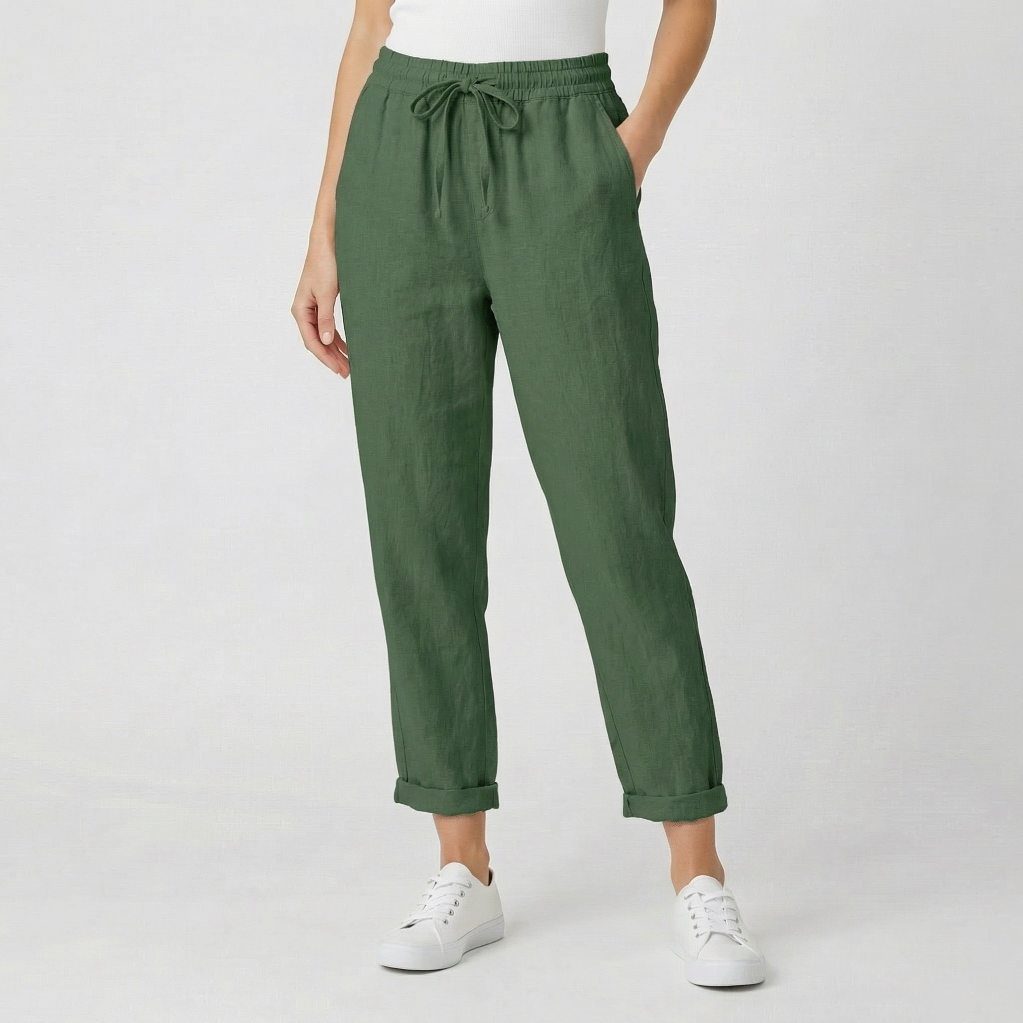 Pantaloni donna verdi con vita elastica arricciata e ampio risvolto sul fondo