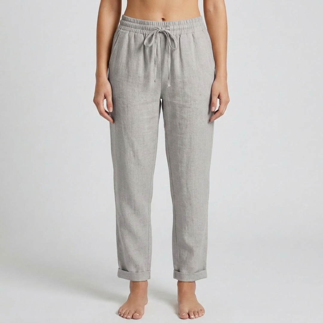 Pantaloni donna grigi con vita elastica, tasche laterali e fondo risvoltato
