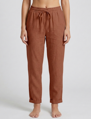 Pantaloni donna marrone terracotta con coulisse annodata e ampio risvolto alla caviglia