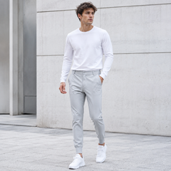 Pantaloni jogger uomo grigi con chiusura frontale a bottone e fondo a costine