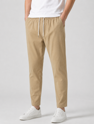 Pantaloni uomo kaki con vita elastica e coulisse chiara, tasche inserite nella cucitura