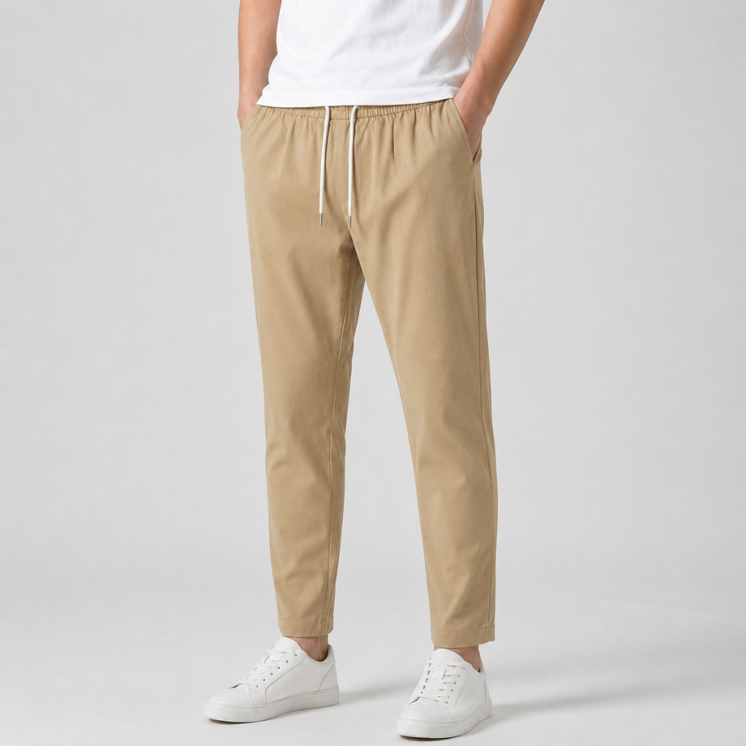 Pantaloni uomo kaki con vita elastica e coulisse chiara, tasche inserite nella cucitura