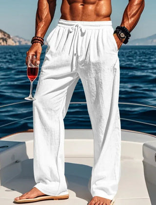 Pantaloni uomo bianchi dalla caduta fluida con cordoncino annodato in vita