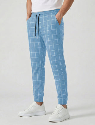 Pantaloni jogger uomo azzurri a quadri bianchi con vita elastica e caviglia stretta