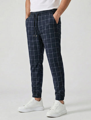 Pantaloni jogger uomo blu navy a quadri bianchi con tasche laterali e fondo stretto