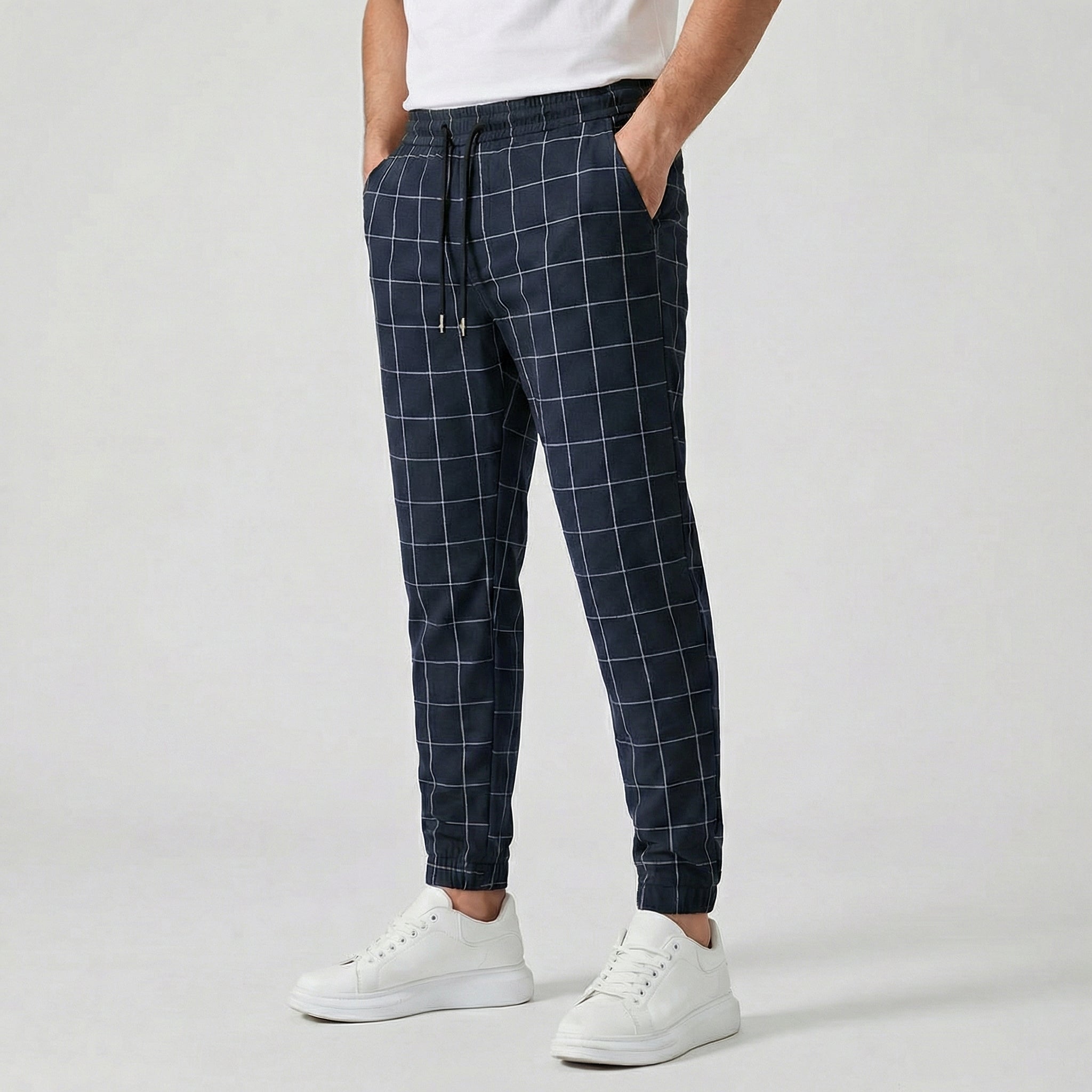 Pantaloni jogger uomo blu navy a quadri bianchi con tasche laterali e fondo stretto