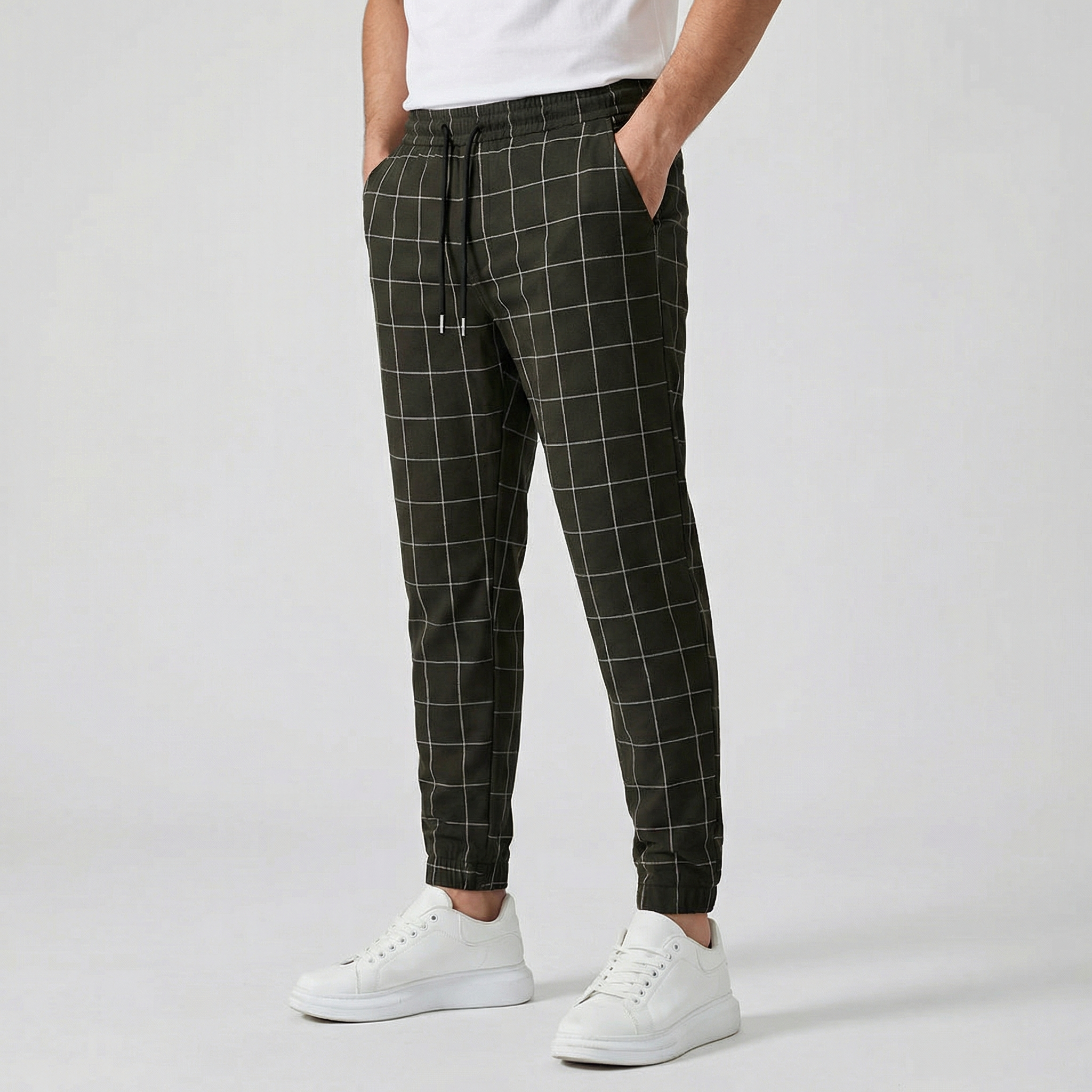 Pantaloni uomo jogger verde militare a quadri con coulisse in vita e polsini elasticizzati