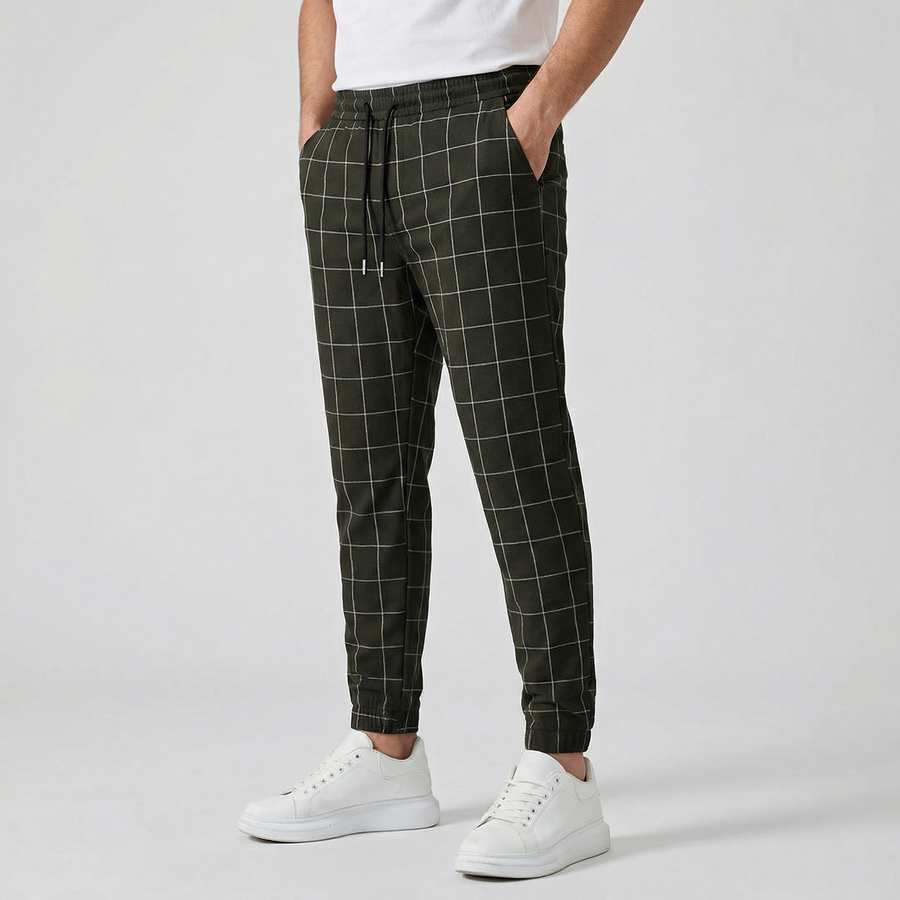 Pantaloni uomo jogger verde militare a quadri con coulisse in vita e polsini elasticizzati